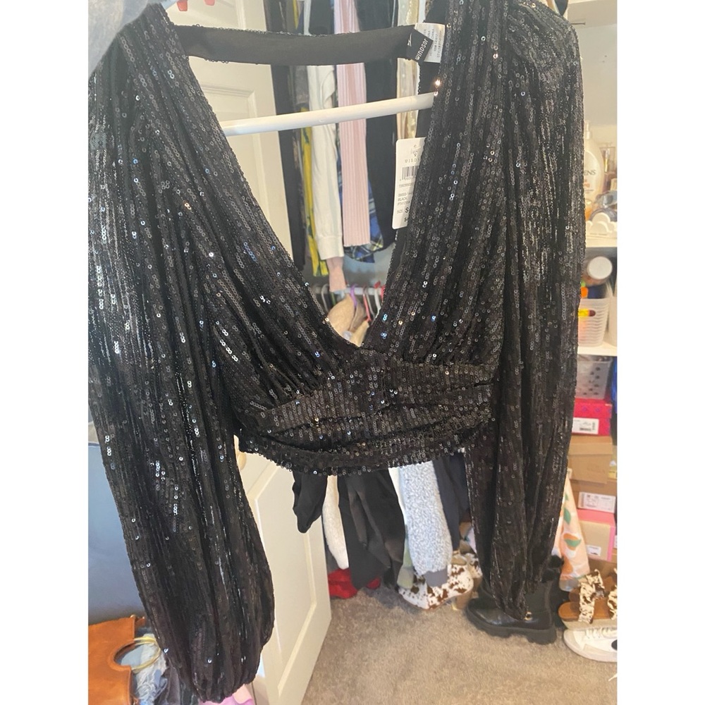 Never worn sparkle v neck open back shirt very cute!!